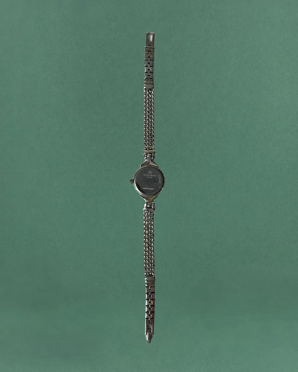 1980s Christian Bernard silver tone chain bracelet quartz watch