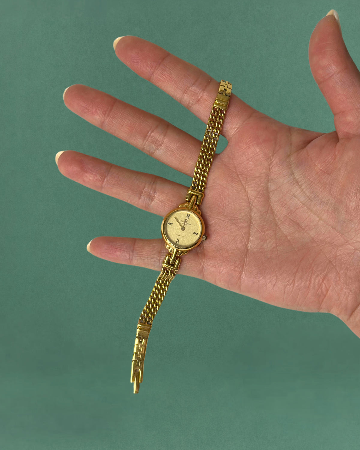 1980s Christian Bernard gold tone chain bracelet quartz watch