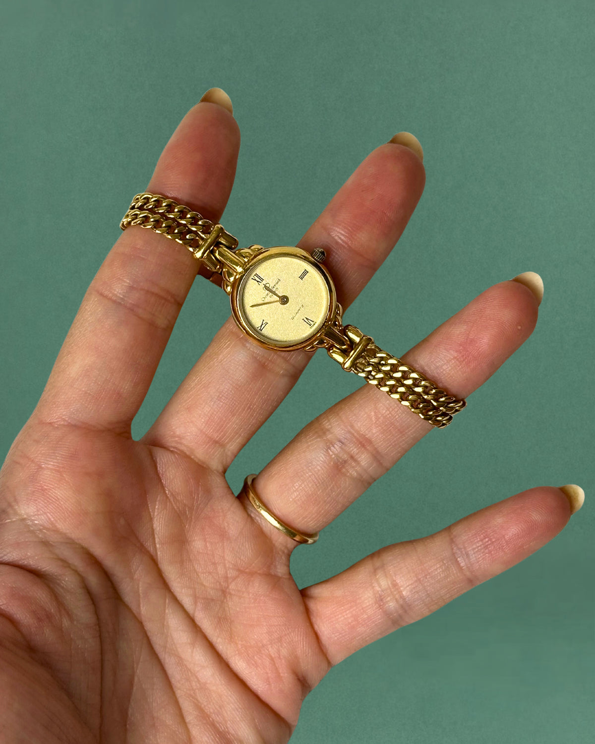 1980s Christian Bernard gold tone chain bracelet quartz watch