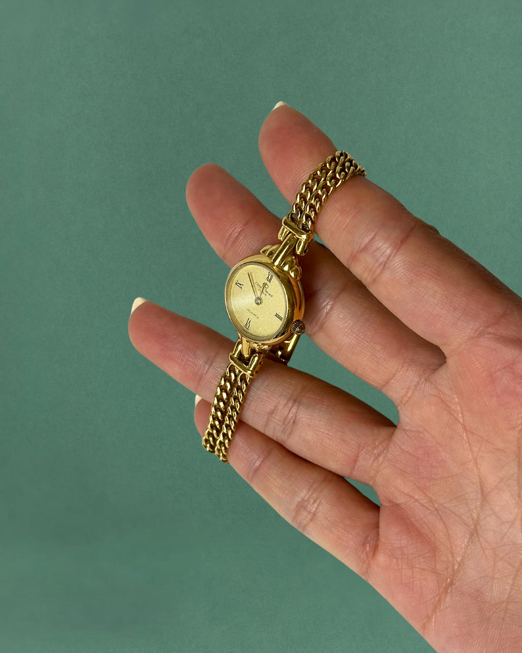 1980s Christian Bernard gold tone chain bracelet quartz watch