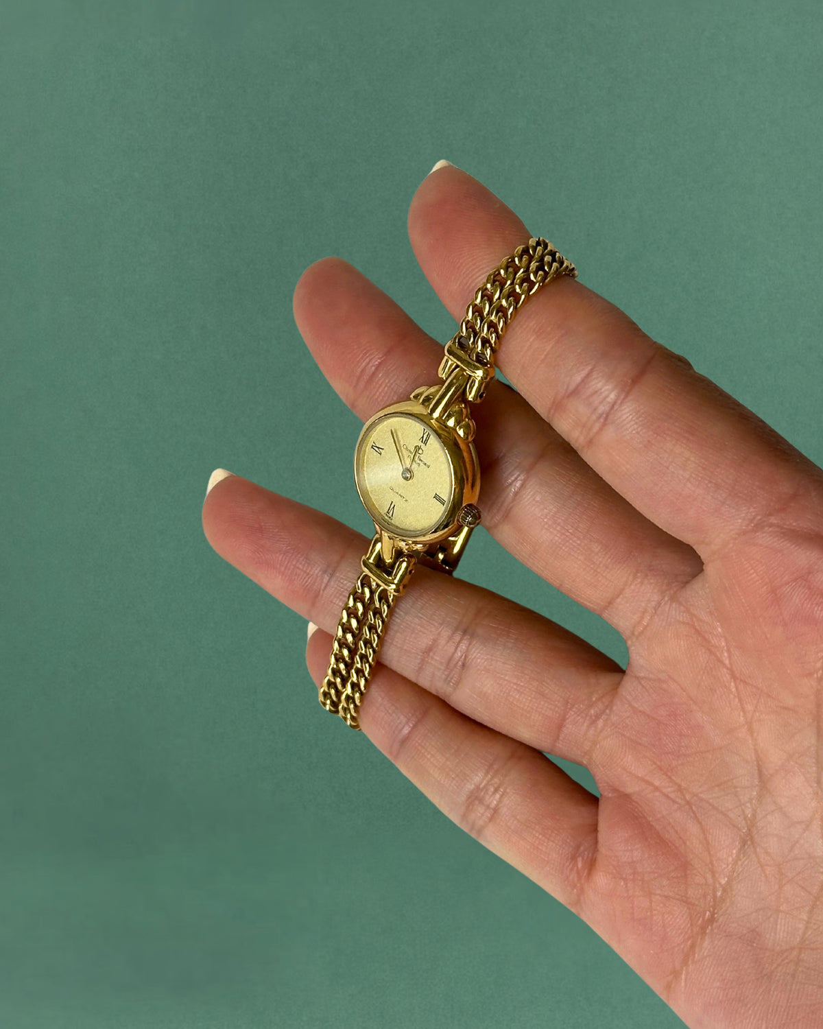 1980s Christian Bernard gold tone chain bracelet quartz watch