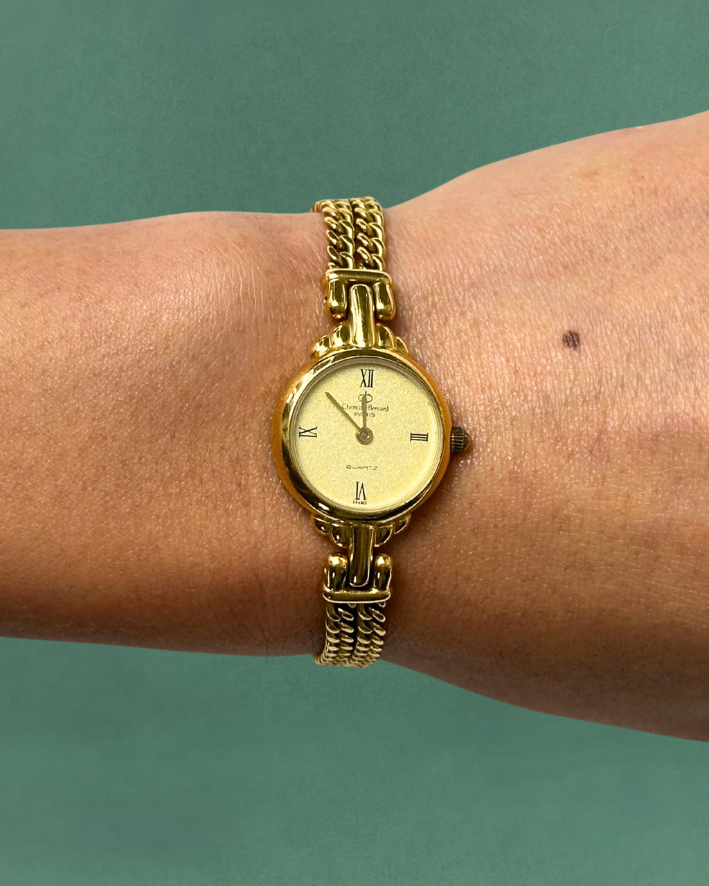 1980s Christian Bernard gold tone chain bracelet quartz watch
