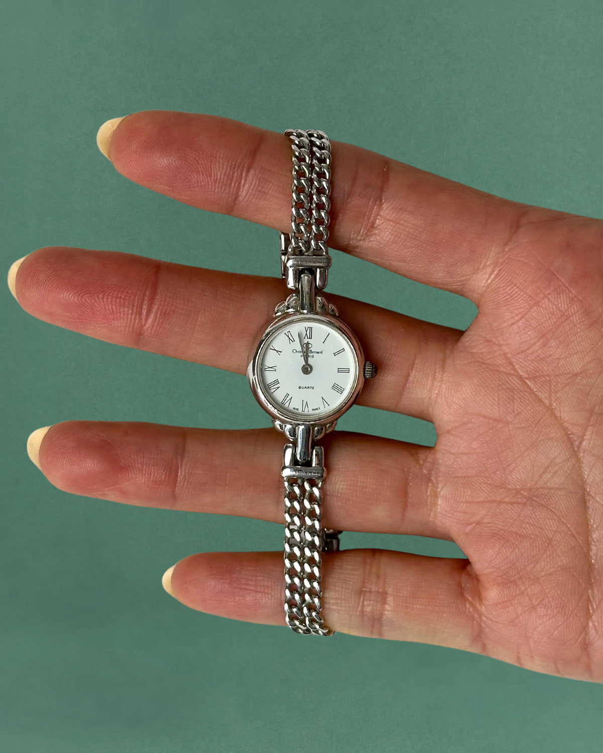 1980s Christian Bernard silver tone chain bracelet quartz watch