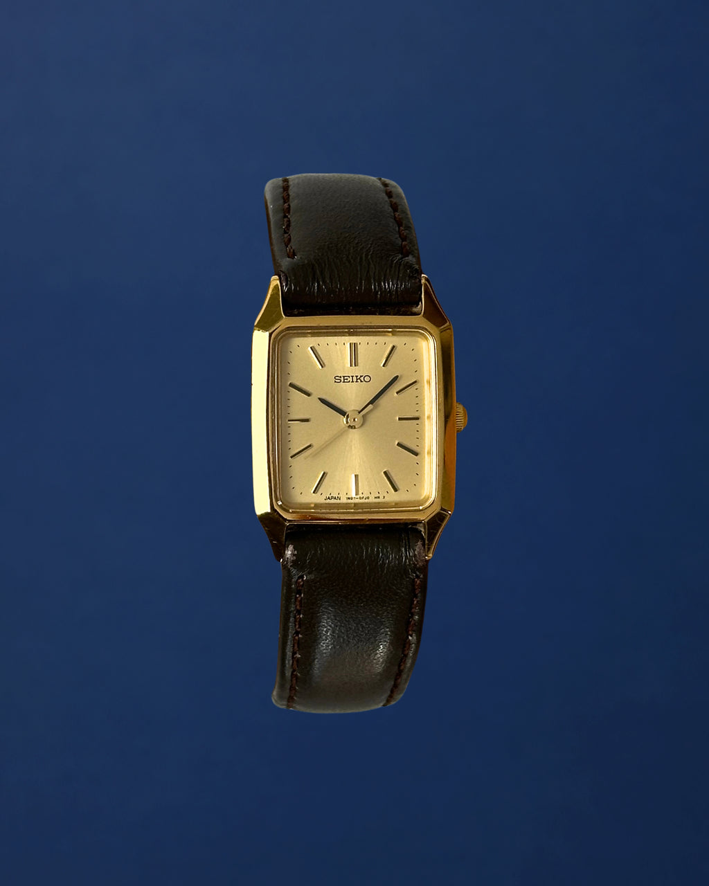 1980s Seiko gold tone square brown leather quartz watch