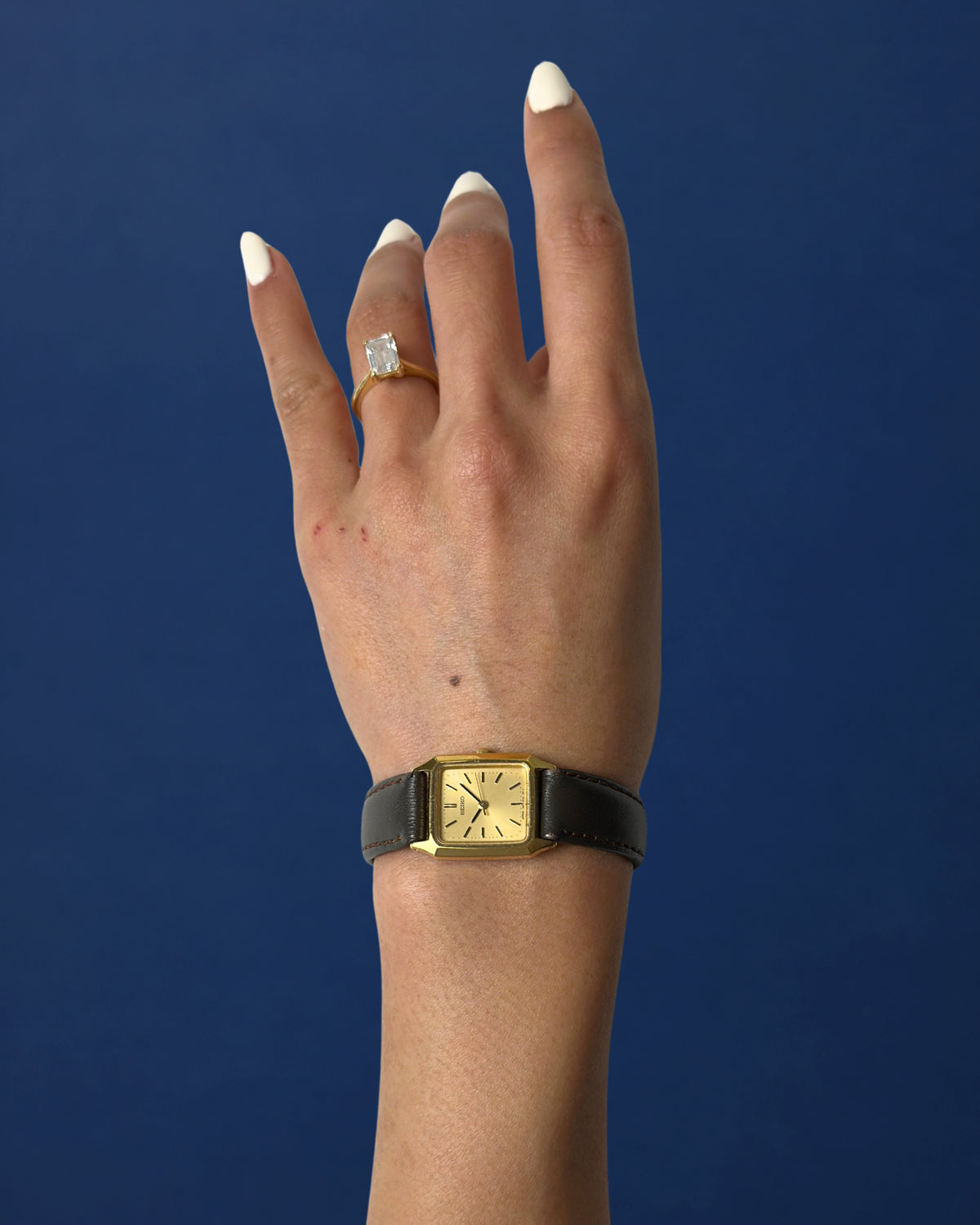 1980s Seiko gold tone square brown leather quartz watch
