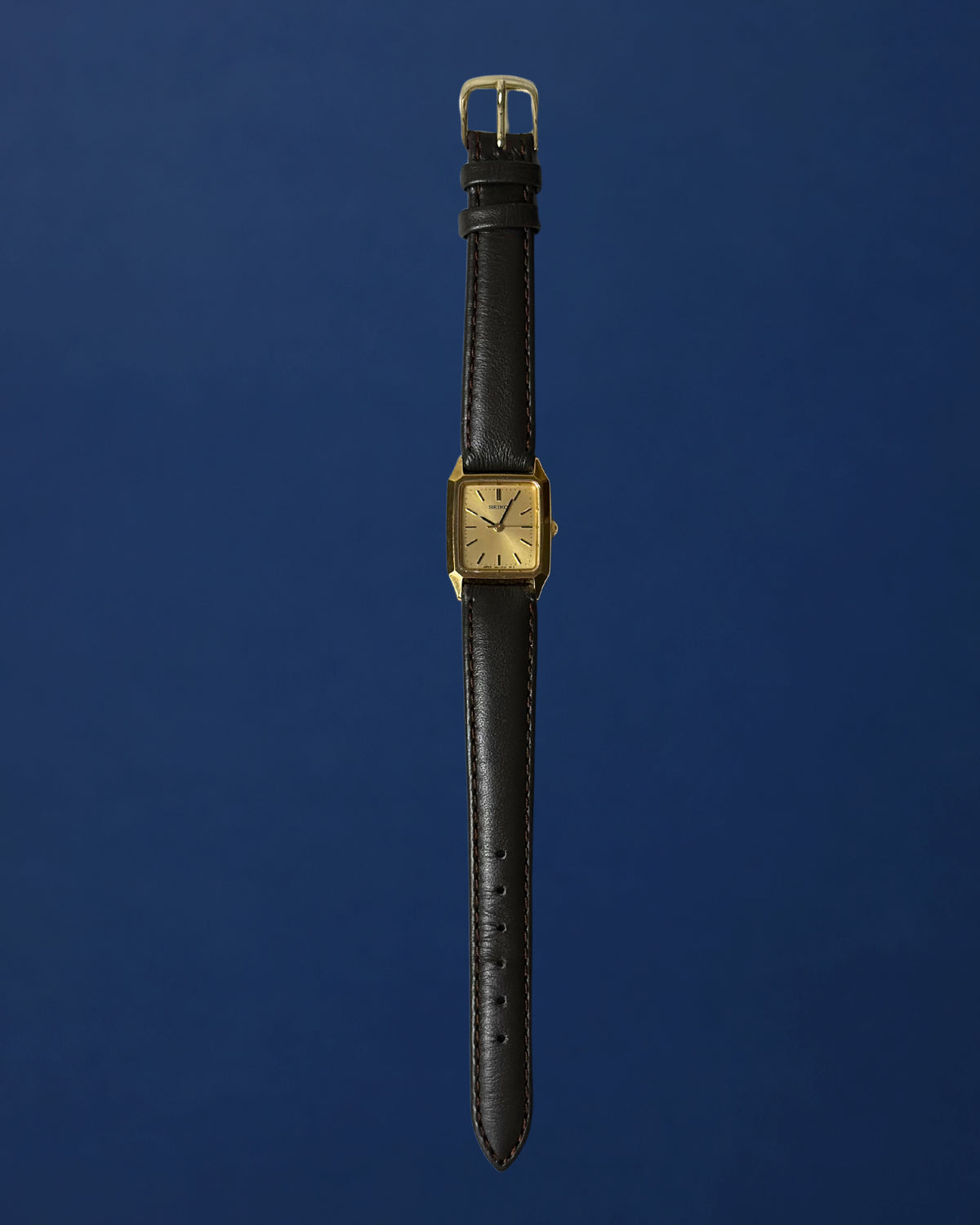 1980s Seiko gold tone square brown leather quartz watch