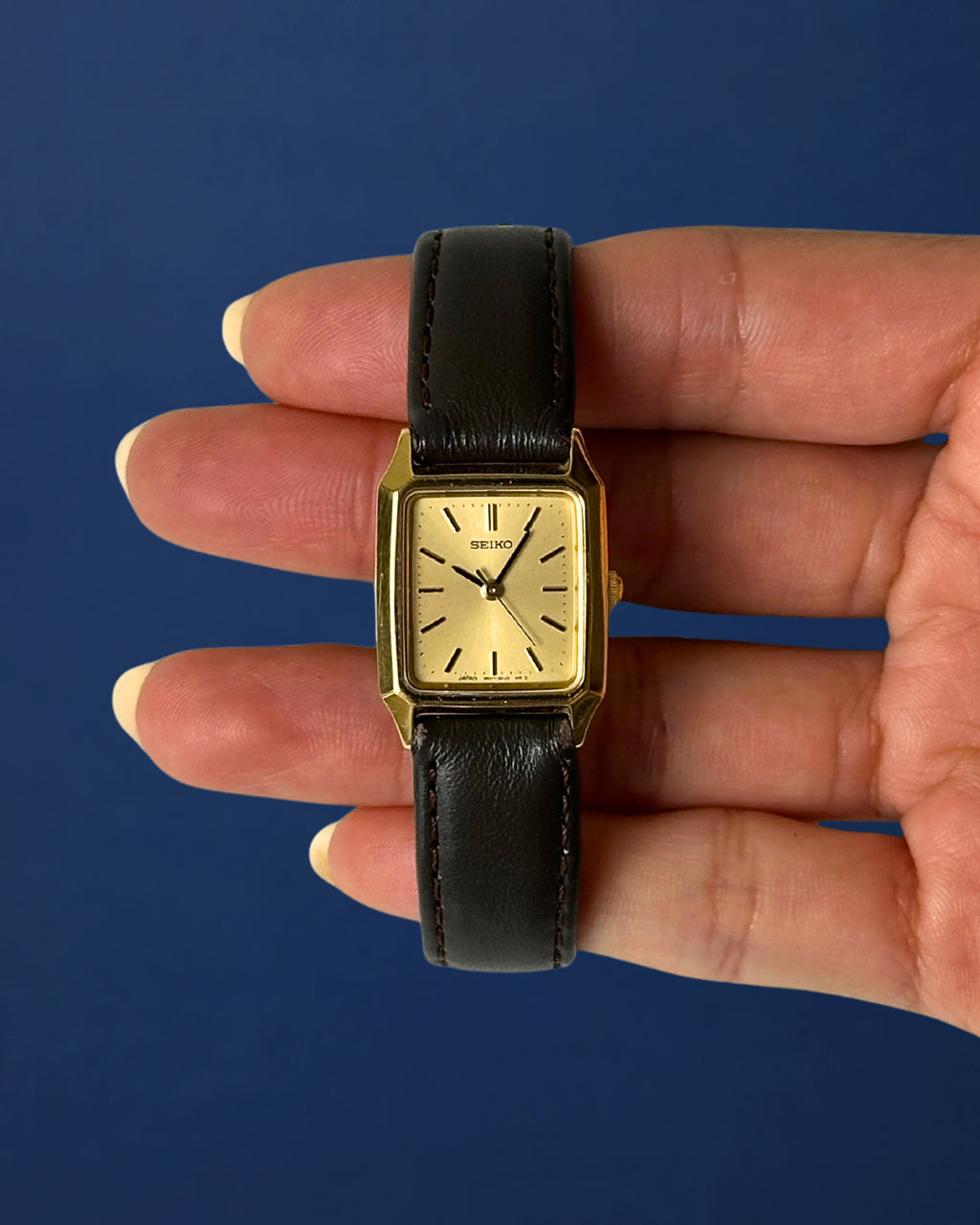 1980s Seiko gold tone square brown leather quartz watch