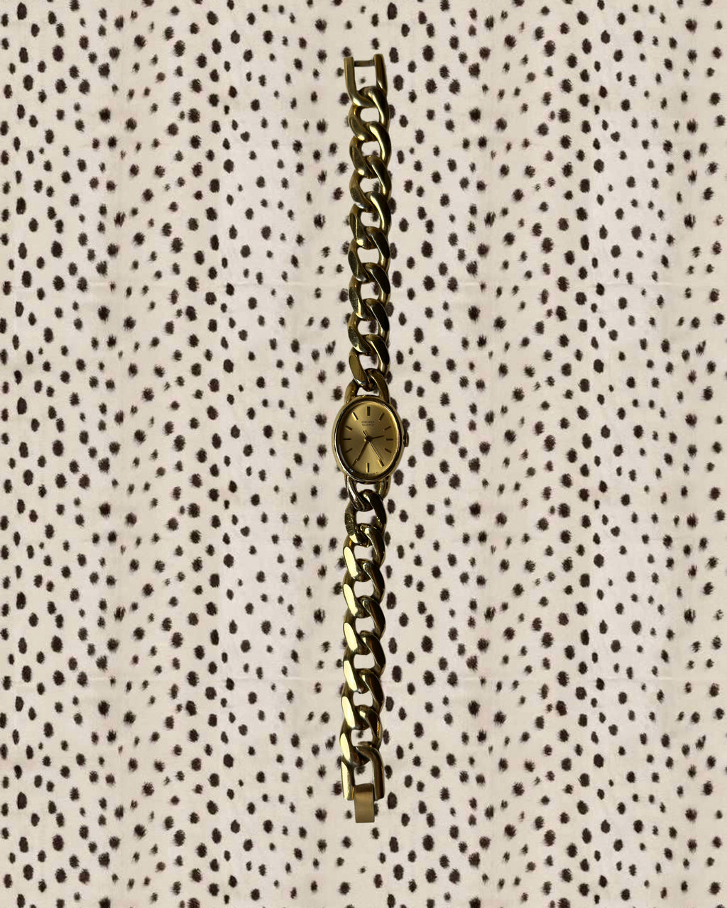 1980s Seiko gold-plated curb chain quartz watch