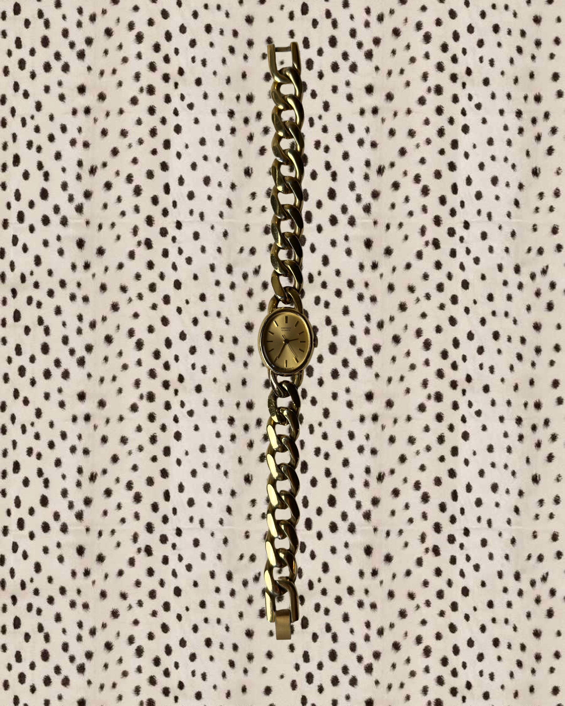 1980s Seiko gold-plated curb chain quartz watch