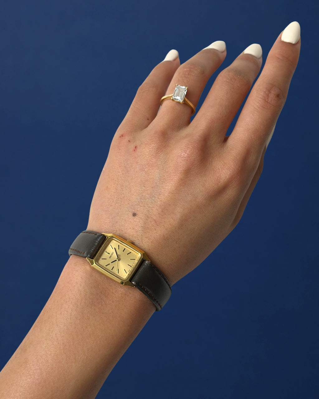 1980s Seiko gold tone square brown leather quartz watch
