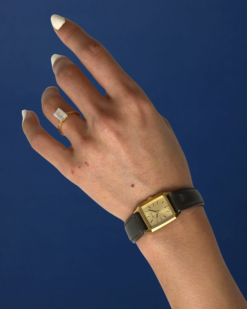 1980s Seiko gold tone square brown leather quartz watch