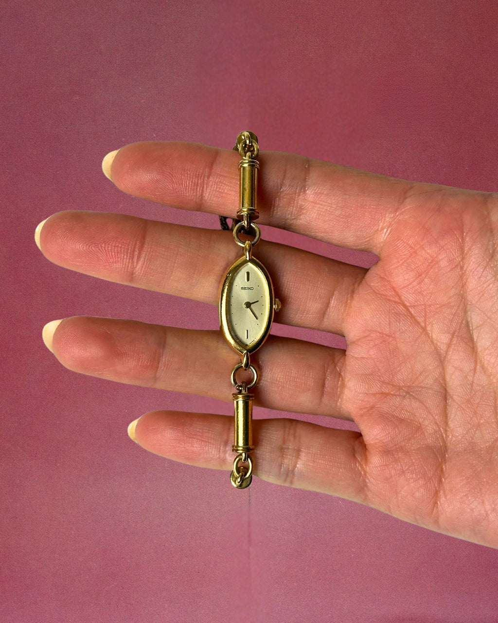 1980s Seiko barrel link gold-plated quartz watch