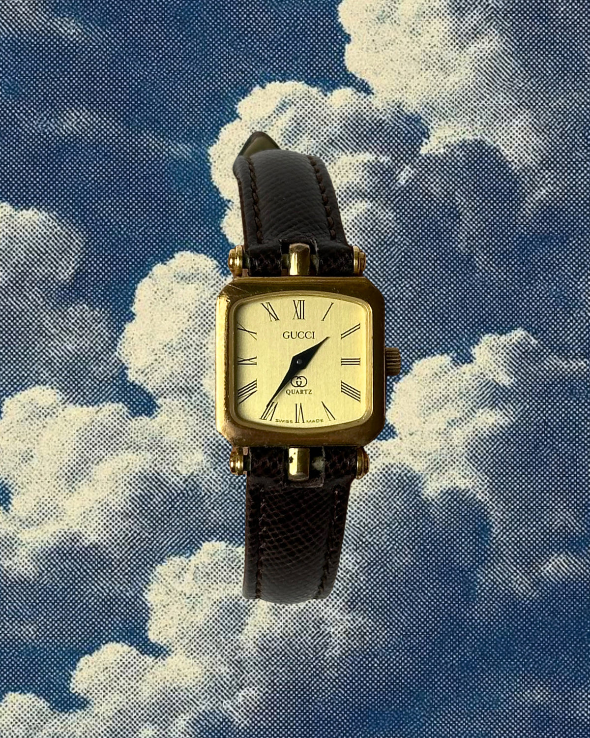 1980s Gucci striped case brown leather quartz watch