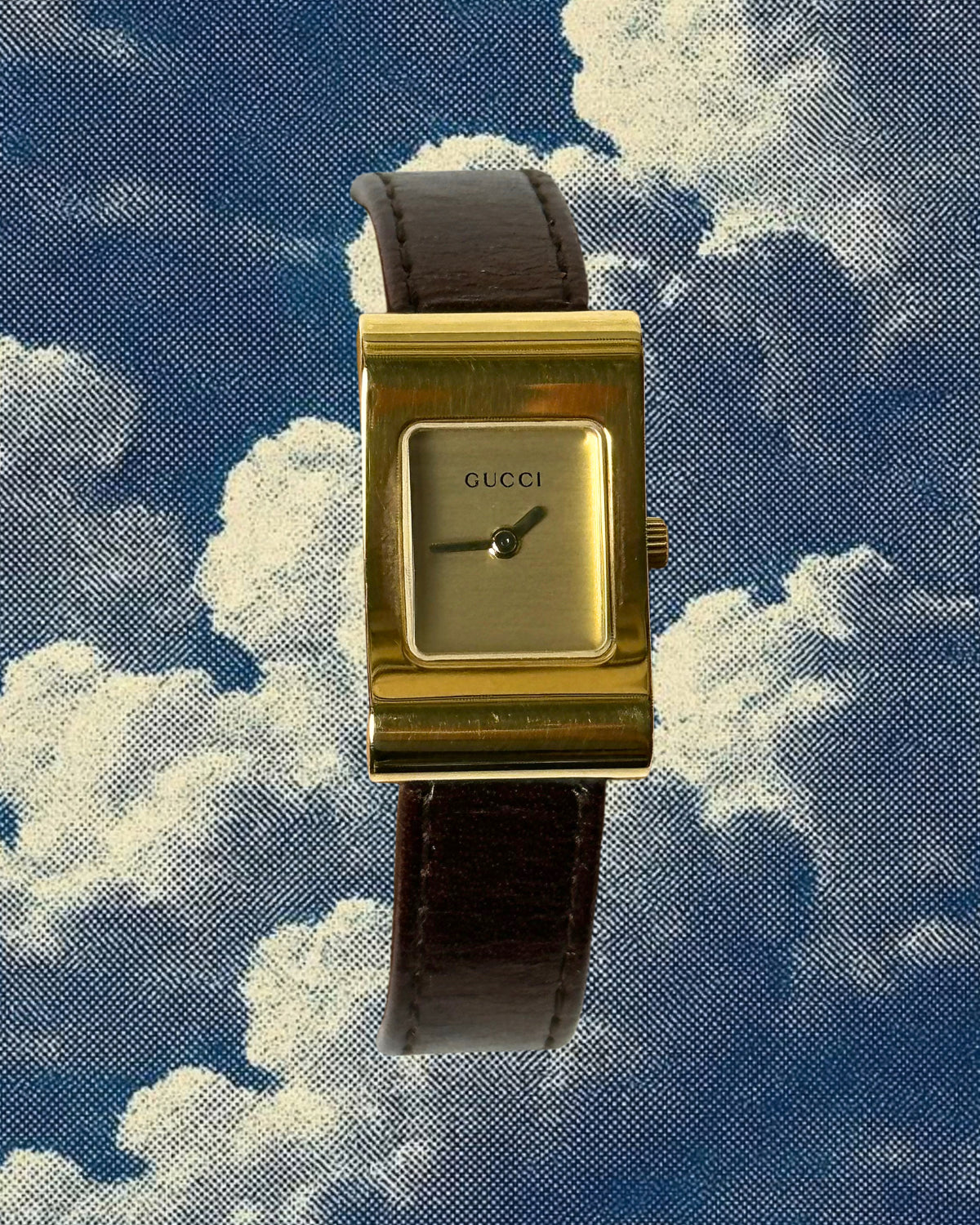 1990s Gucci gold-plated brown leather quartz watch