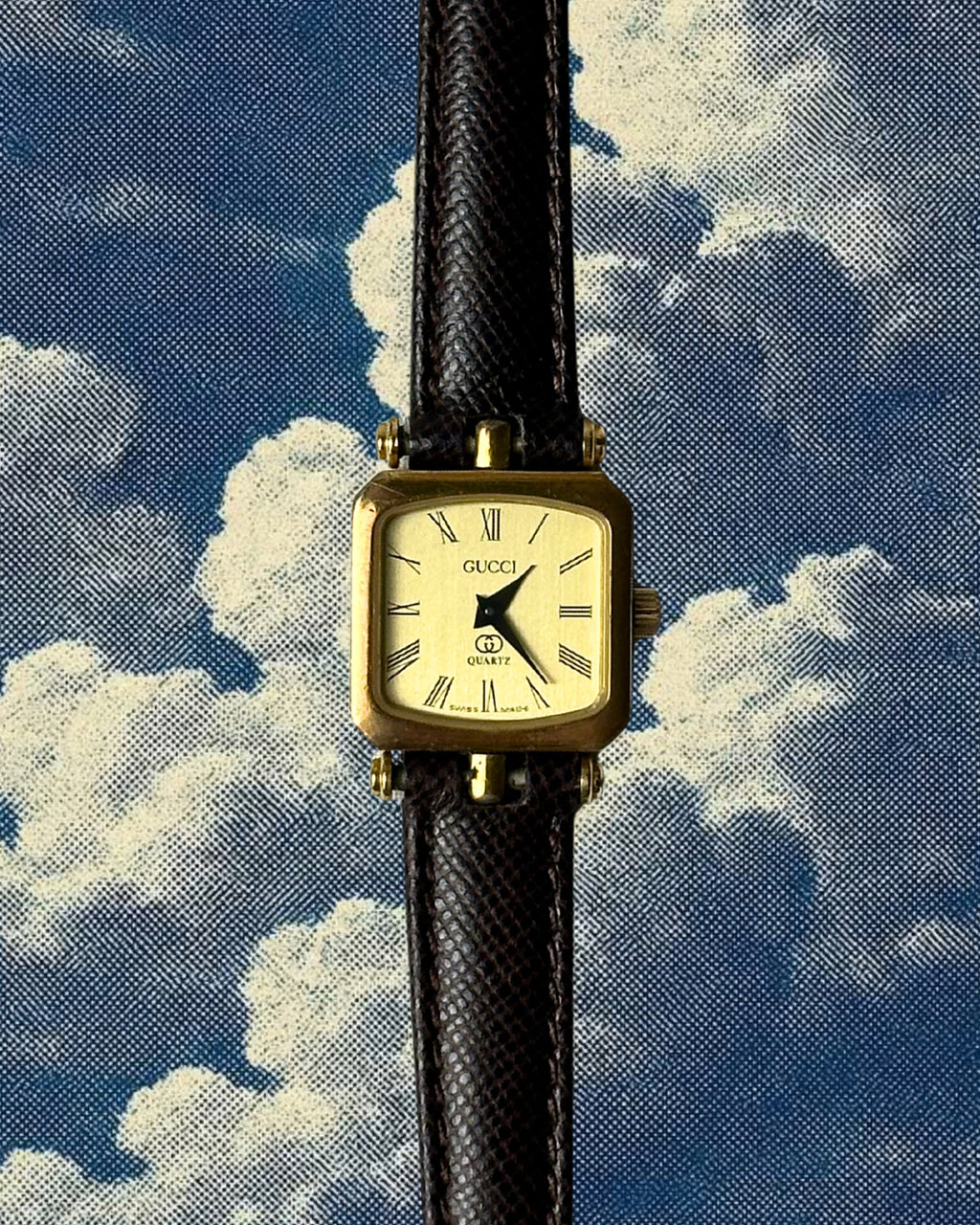 1980s Gucci striped case brown leather quartz watch