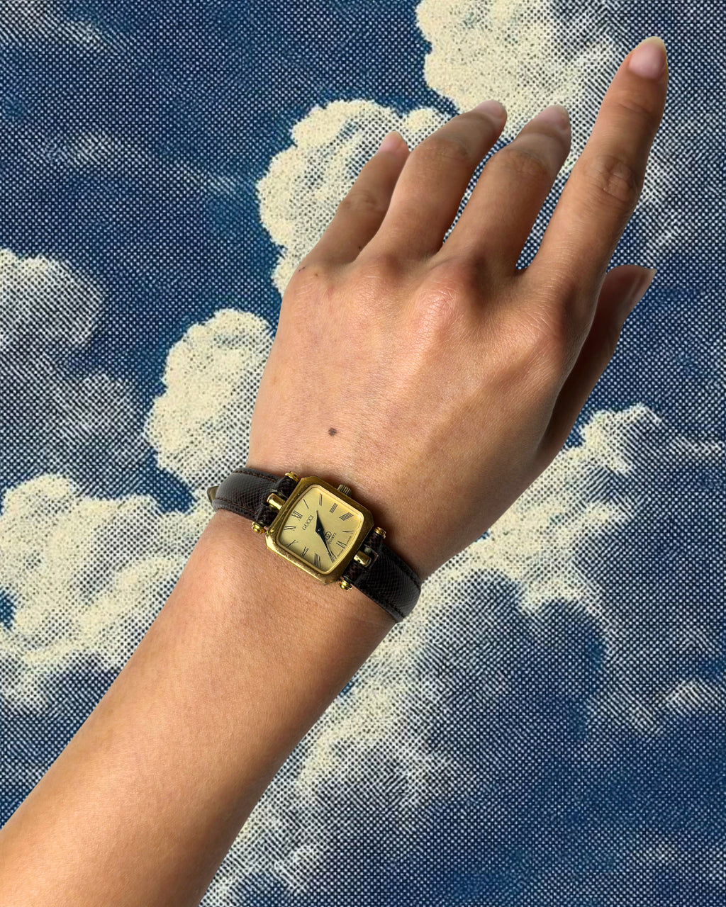 1980s Gucci striped case brown leather quartz watch