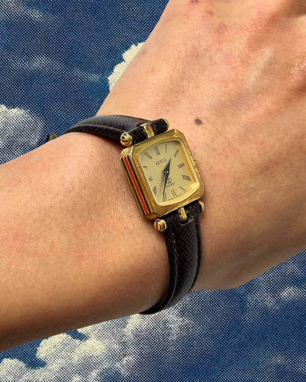 1980s Gucci striped case brown leather quartz watch