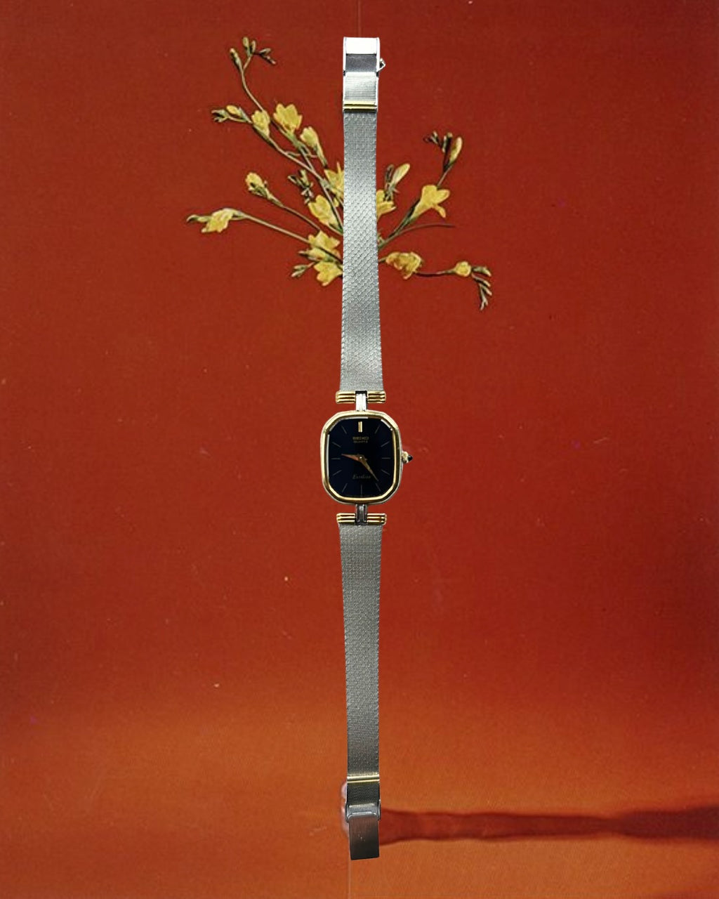 1980s Seiko Exceline black dial two-tone quartz watch