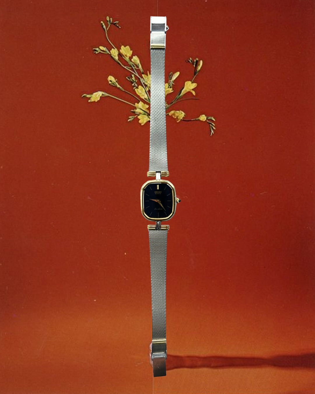 1980s Seiko Exceline black dial two-tone quartz watch