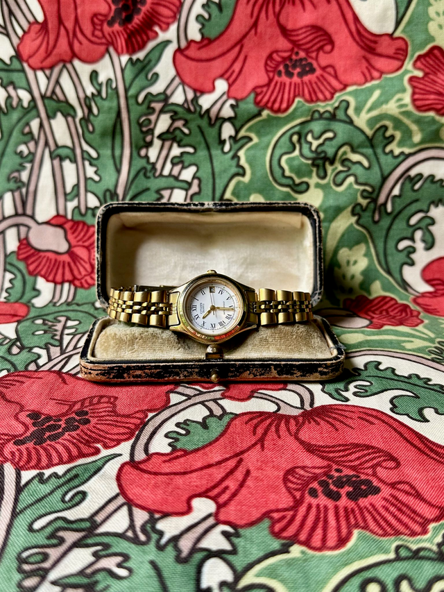 1980s Citizen polished gold tone quartz watch