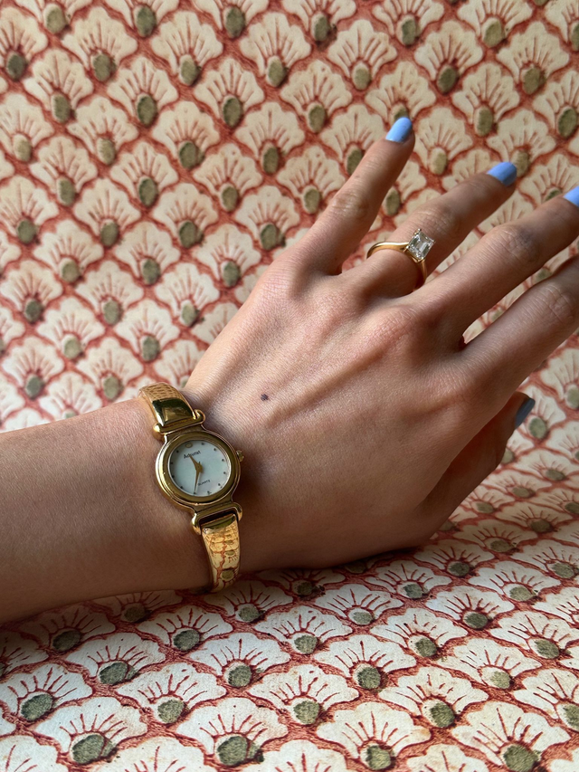1990s Accurist Mother of Pearl Bangle Quartz Watch