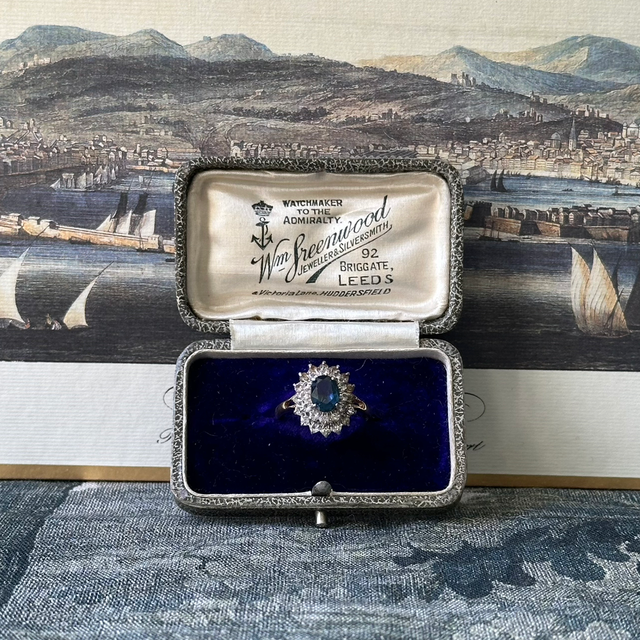 Vintage blue stone and rhinestone halo ring