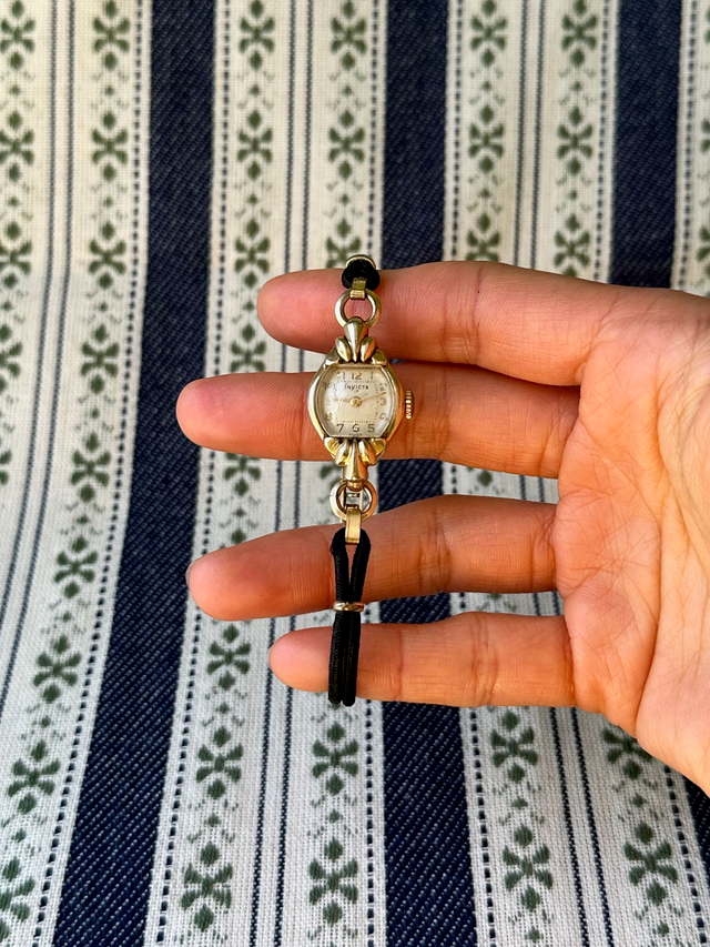 1950s Invicta black cordette mechanical watch
