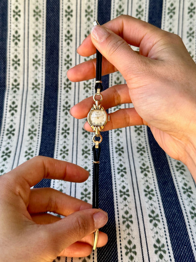 1950s Invicta black cordette mechanical watch