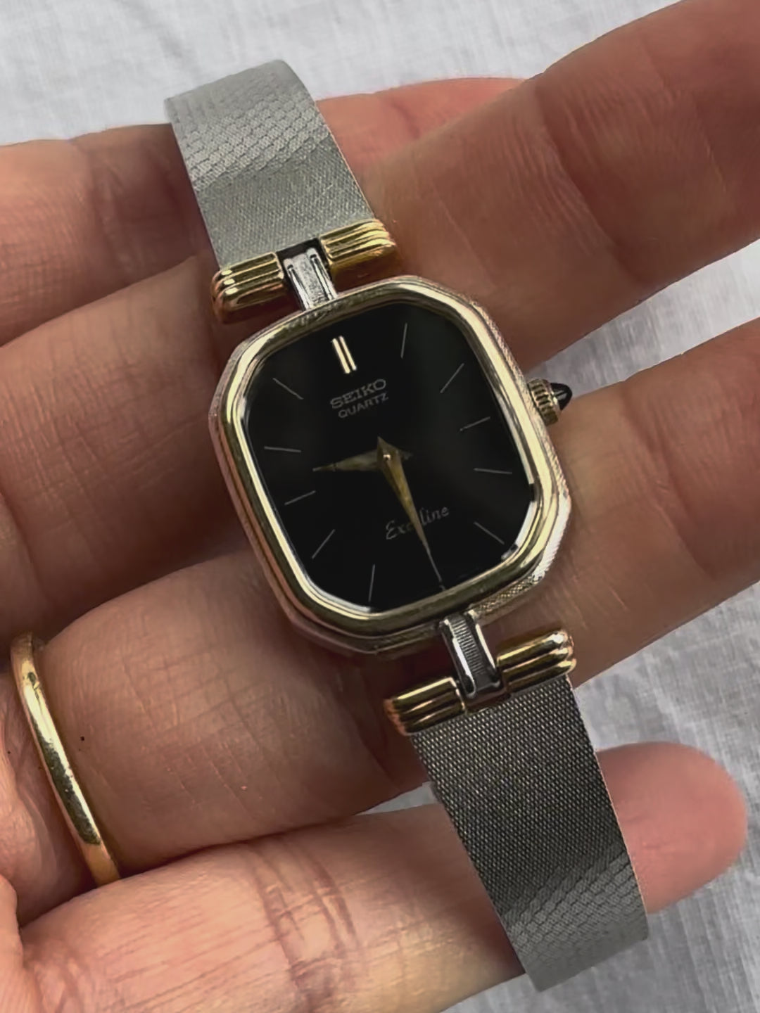 1980s Seiko Exceline black dial two-tone quartz watch