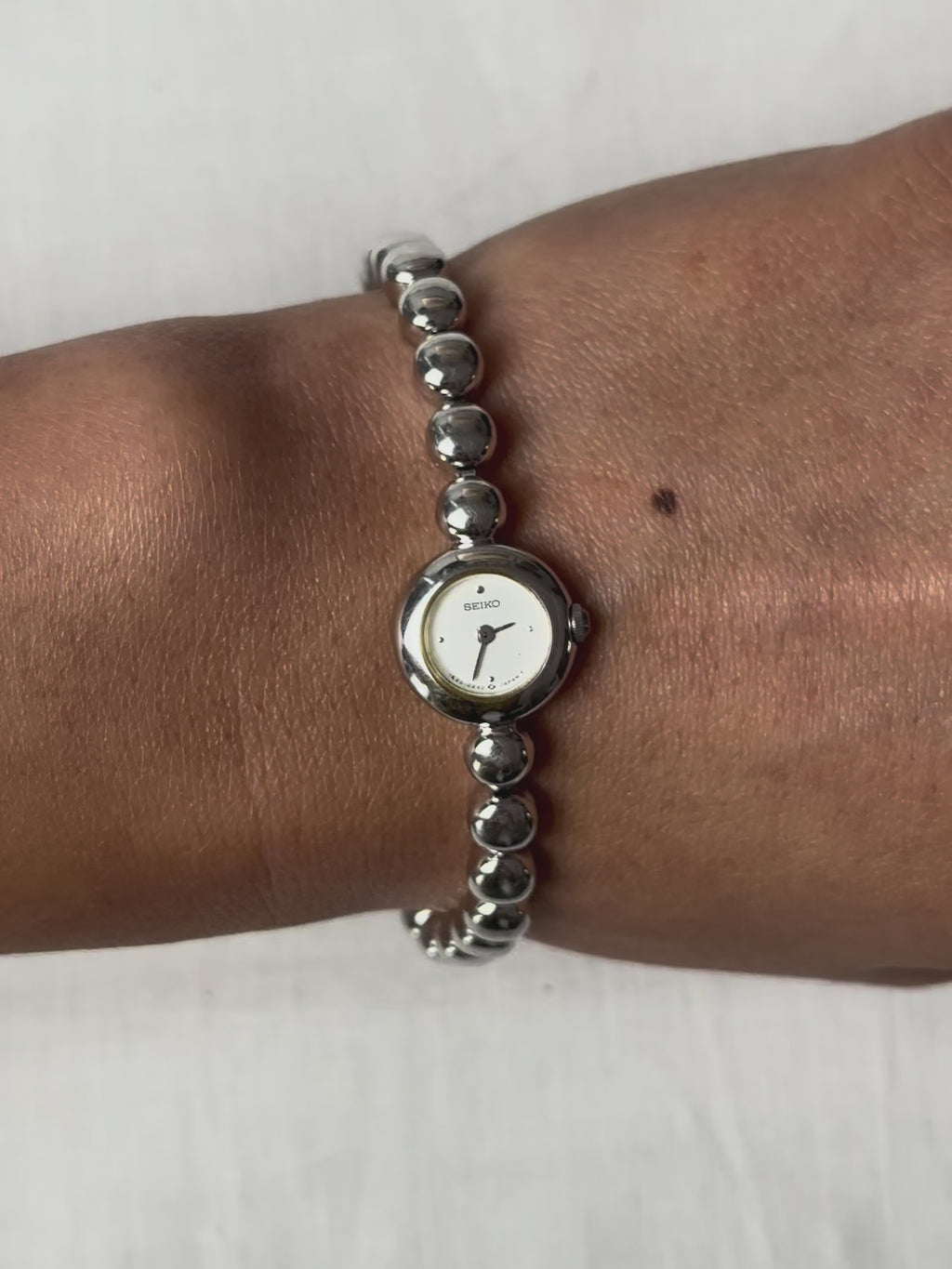 1980s Seiko silver tone orb link quartz watch