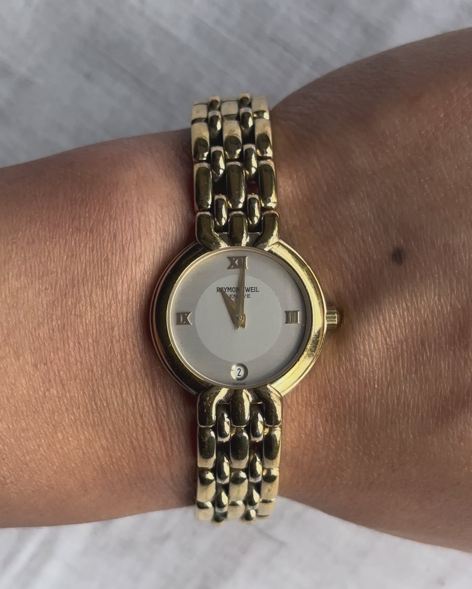 1980s Raymond Weil gold-plated round quartz watch