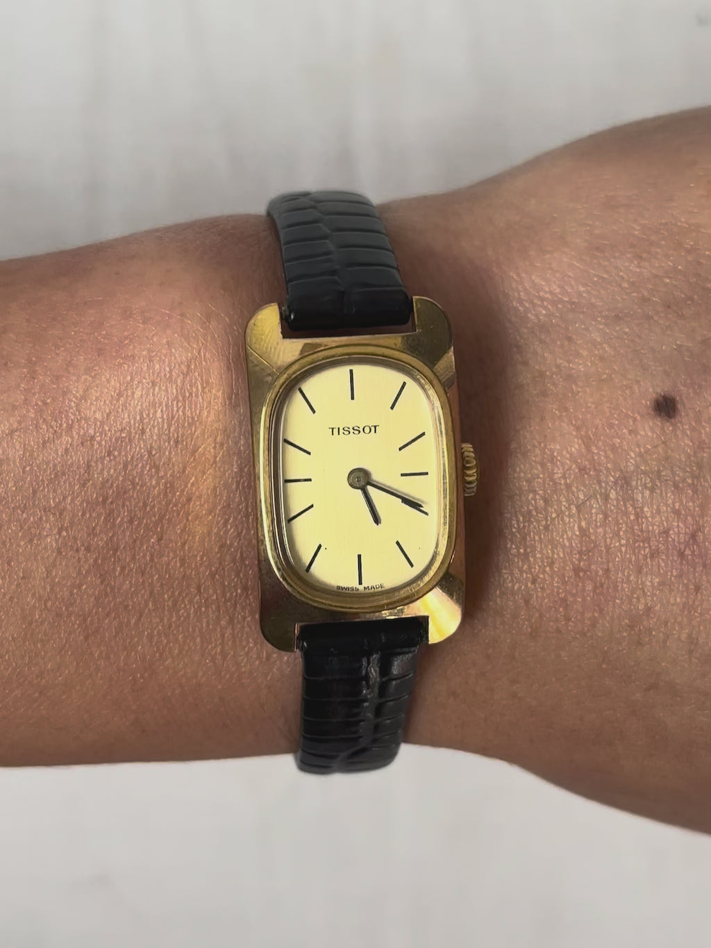 1980s Tissot gold-tone black leather mechanical watch