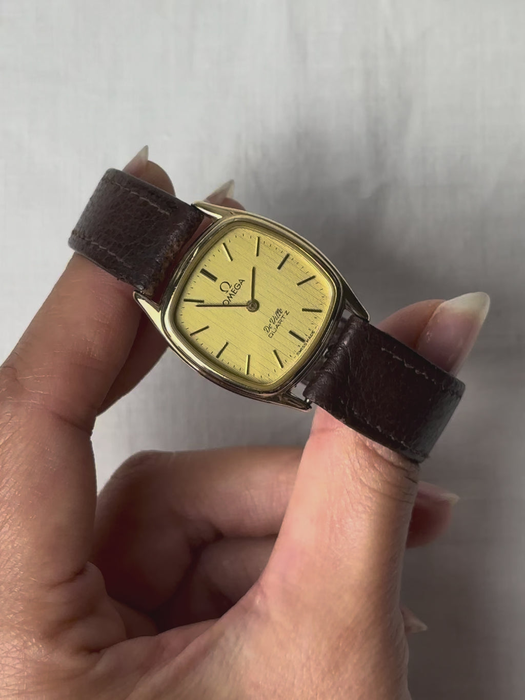 1980s Omega De Ville brown leather quartz watch