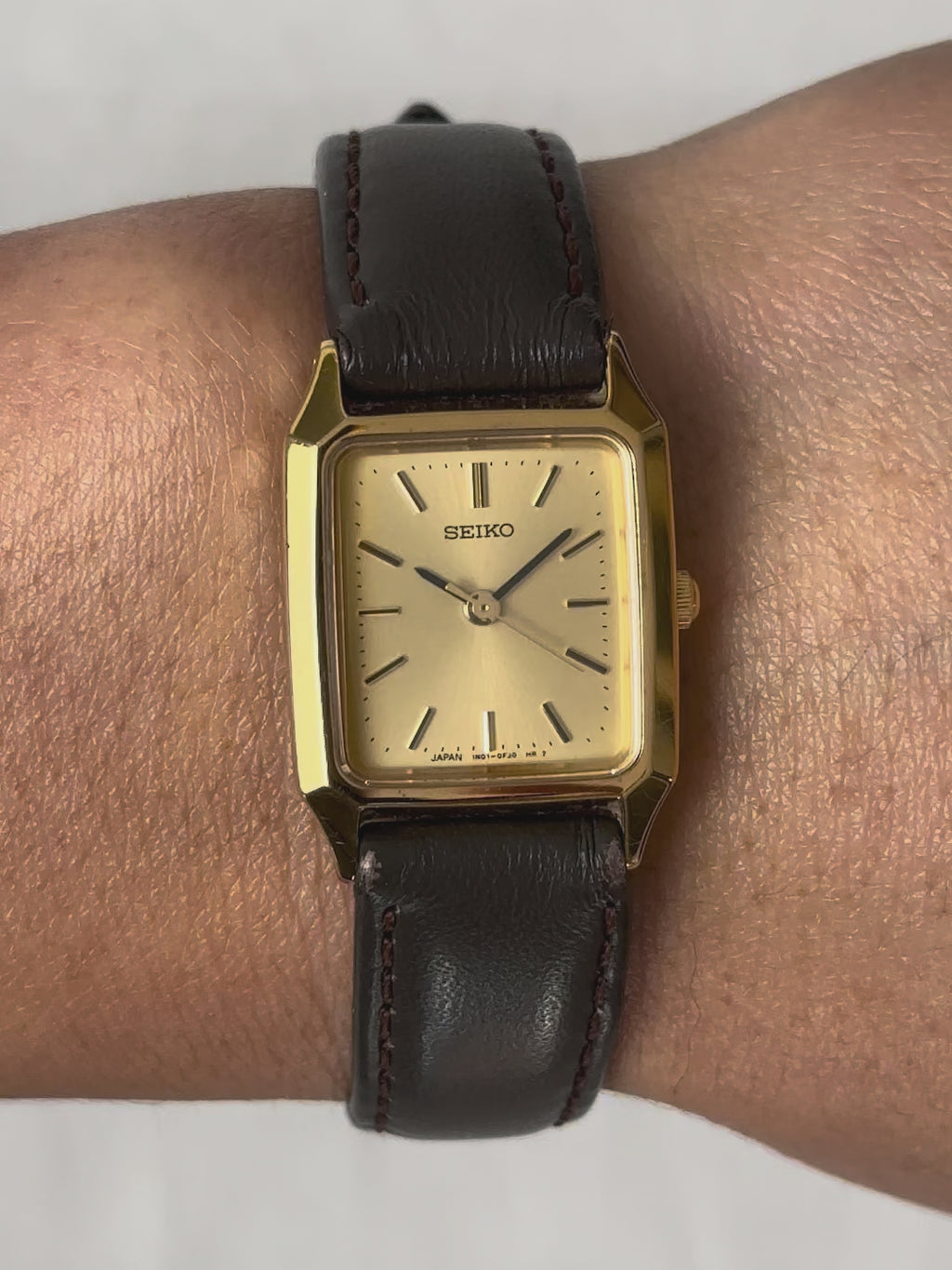 1980s Seiko gold tone square brown leather quartz watch