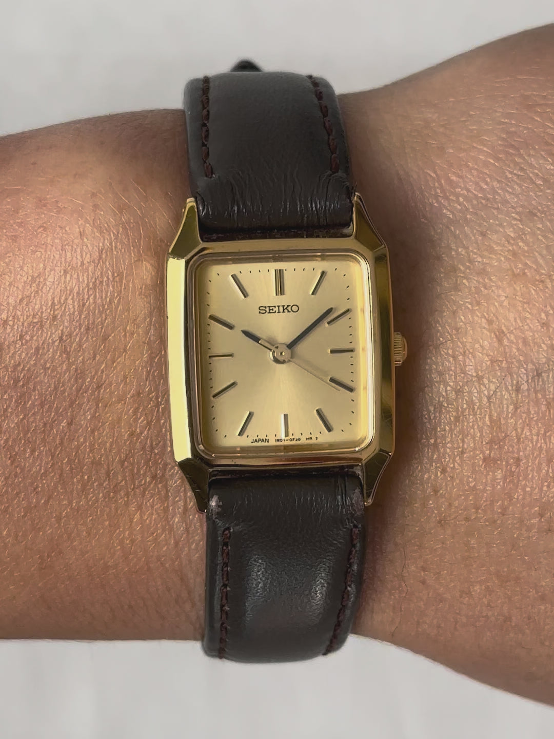 1980s Seiko gold tone square brown leather quartz watch