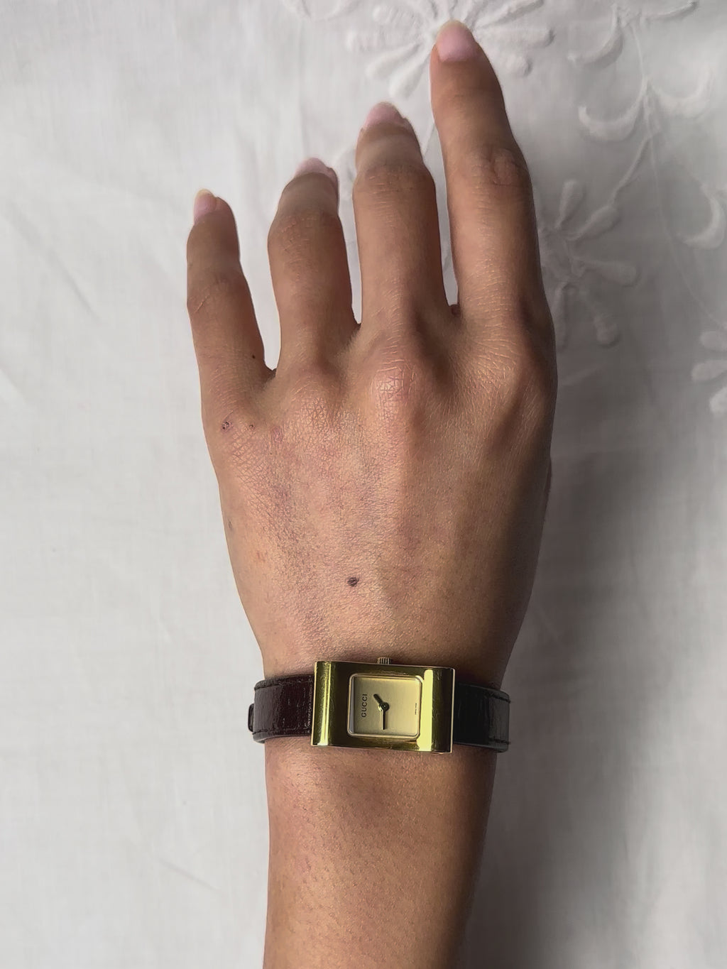 1990s Gucci gold-plated brown leather quartz watch