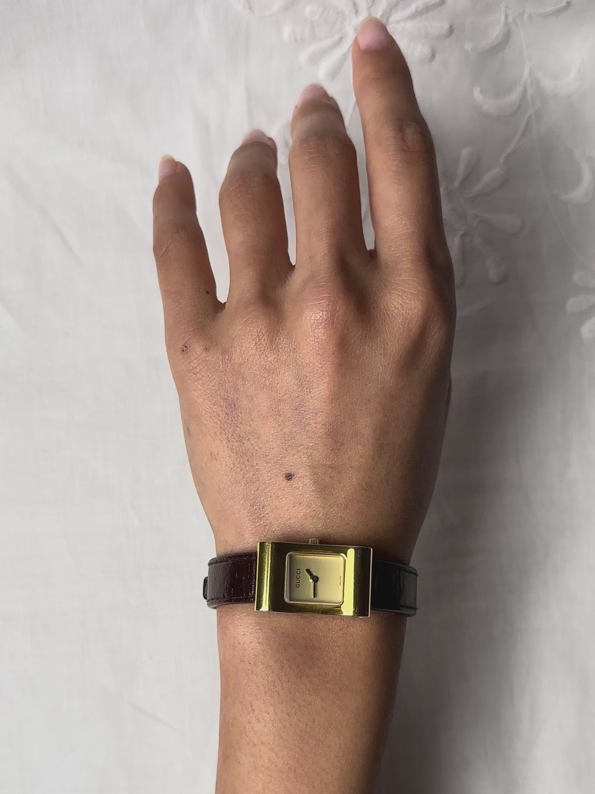 1990s Gucci gold-plated brown leather quartz watch