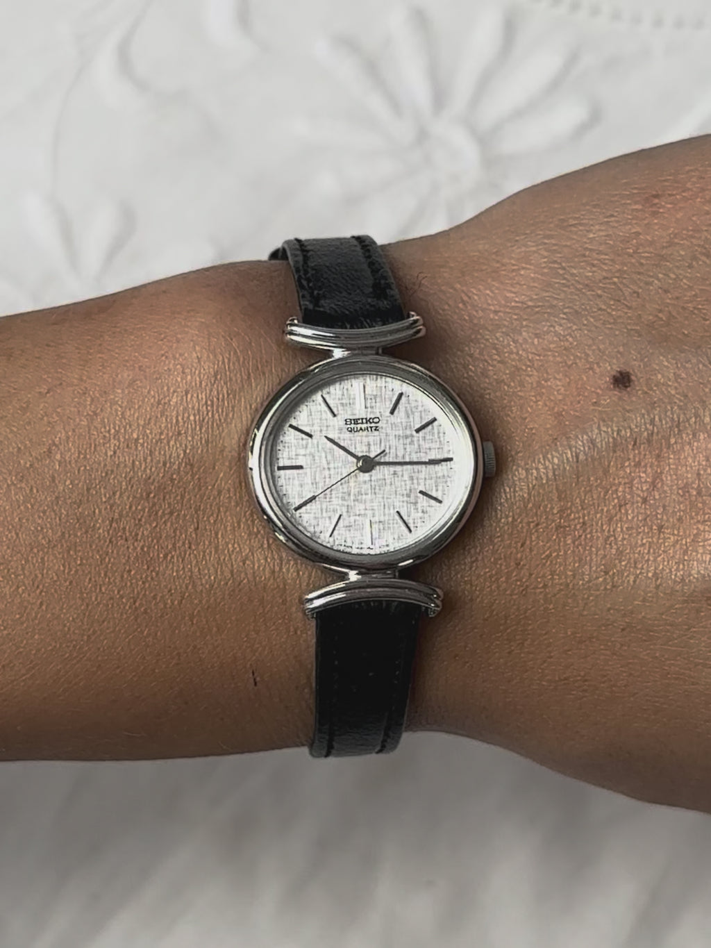 1980s Seiko round black leather quartz watch