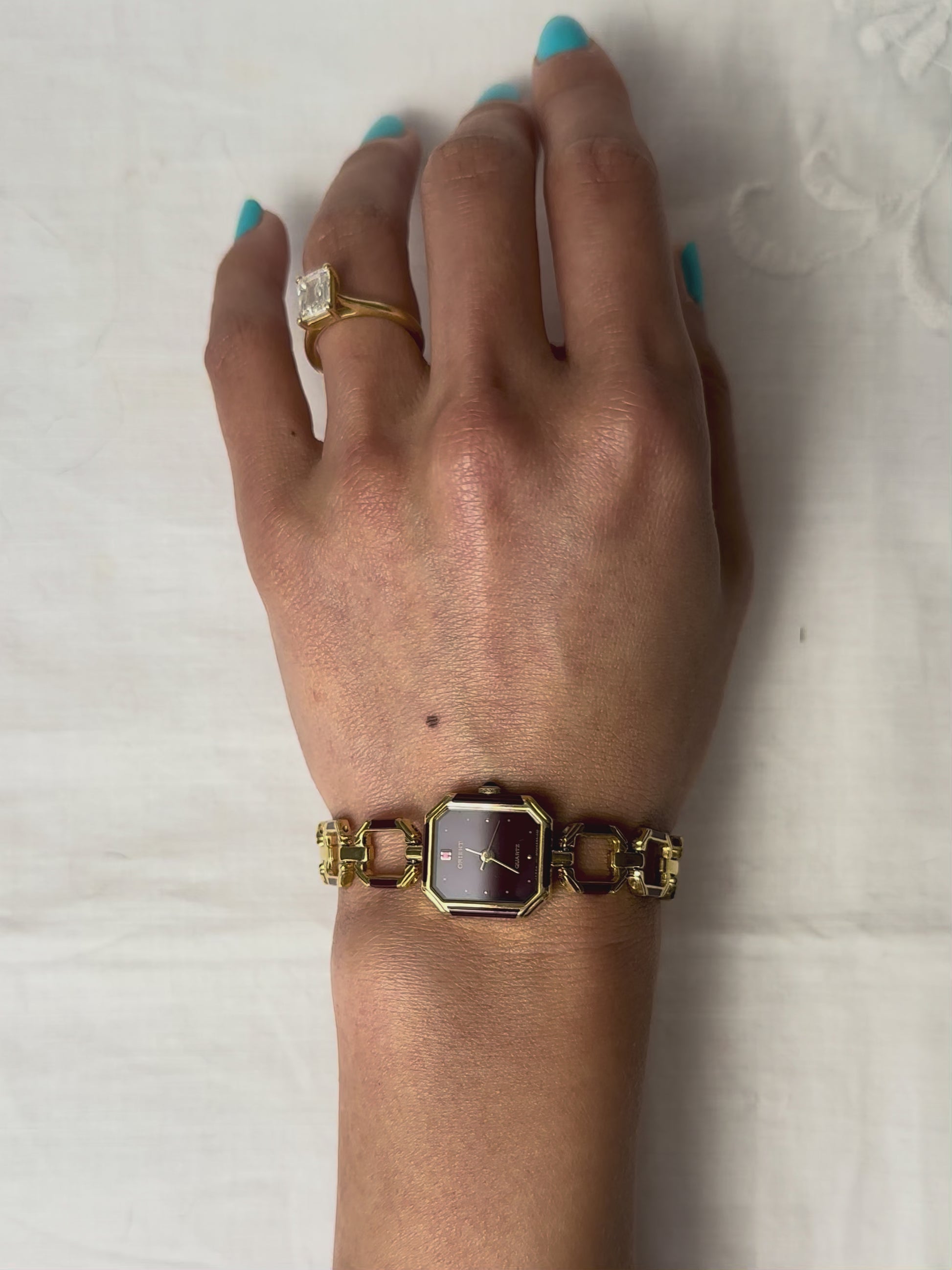 1980s Orient burgundy octagon quartz watch