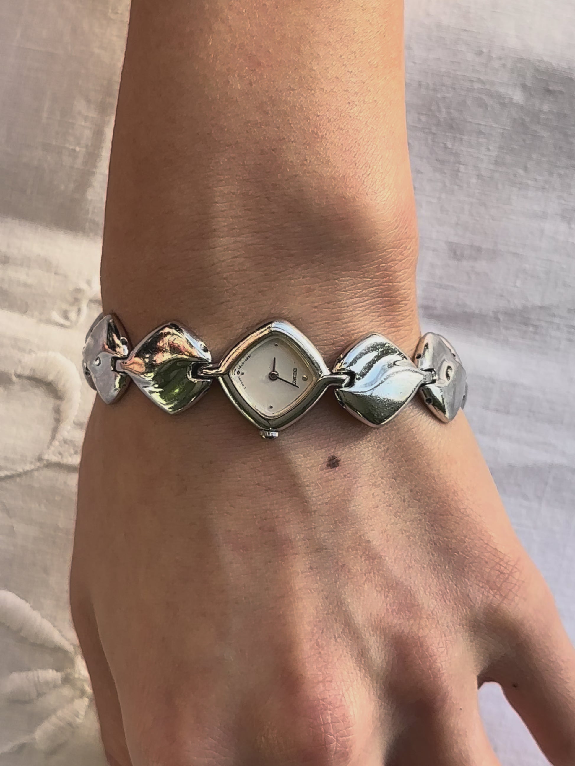 1980s Seiko rhombus silver tone quartz watch