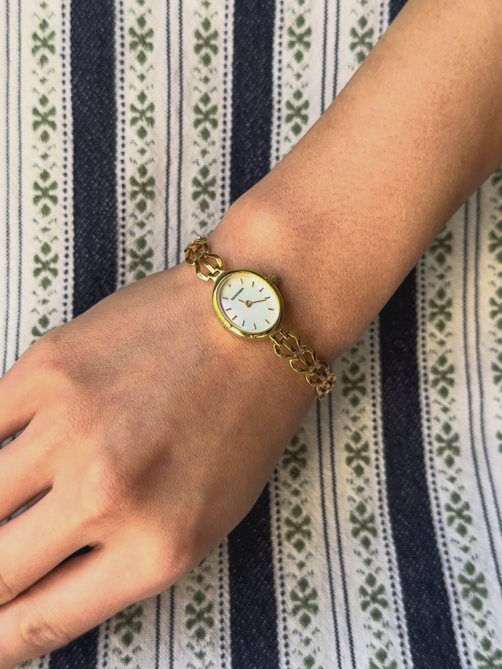 1980s Sekonda mother of pearl gold-plated chain watch