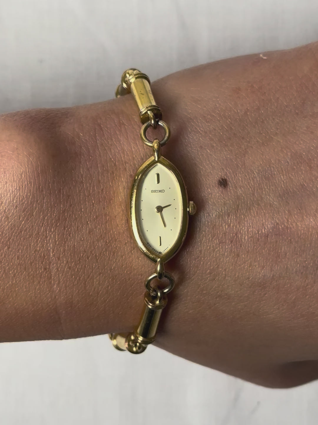 1980s Seiko barrel link gold-plated quartz watch