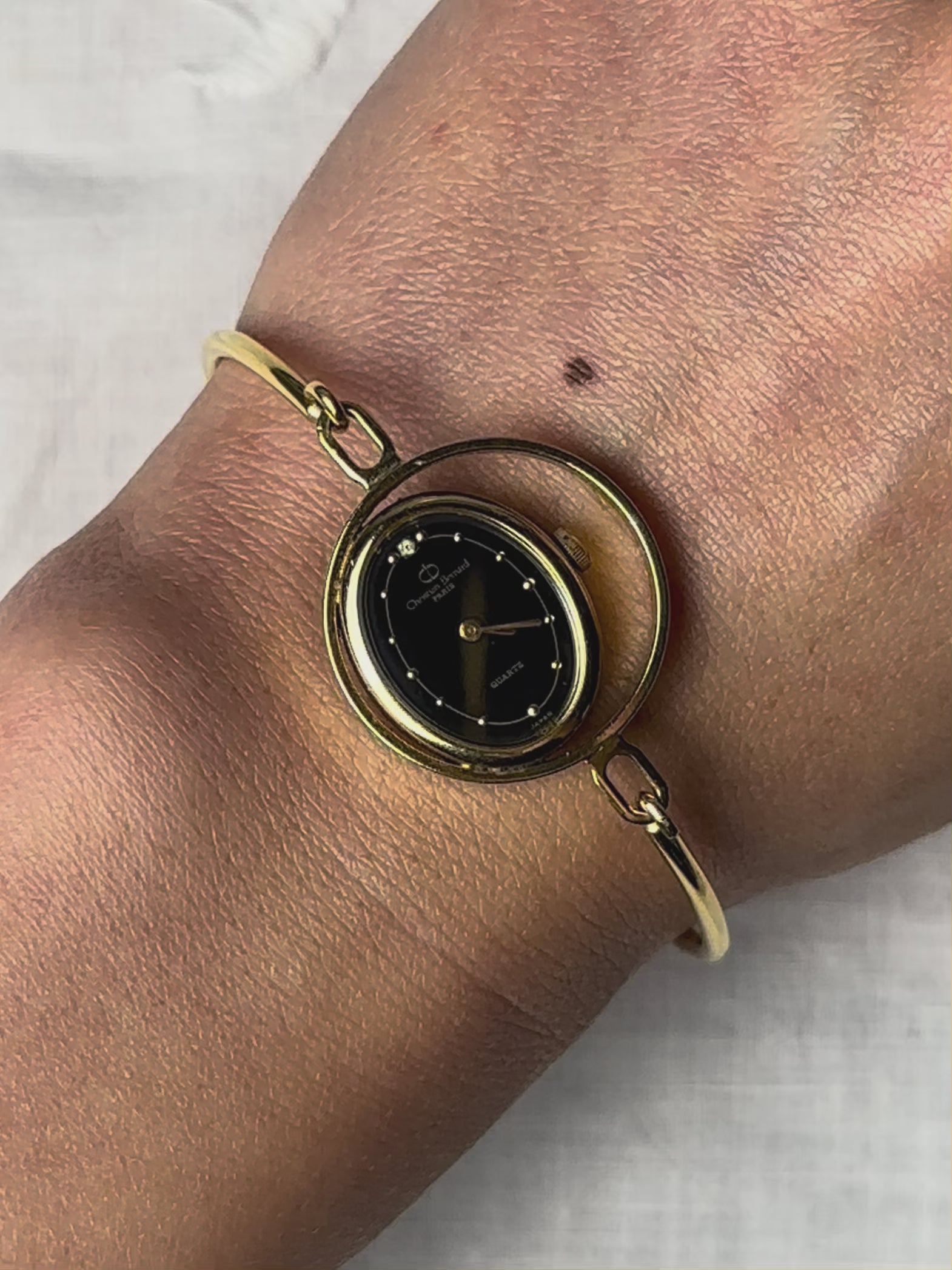 1980s Christian Bernard gold-plated bangle quartz watch