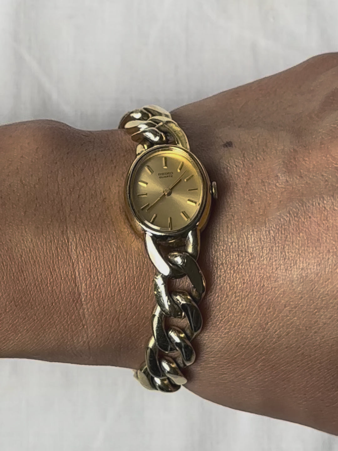 1980s Seiko gold-plated curb chain quartz watch