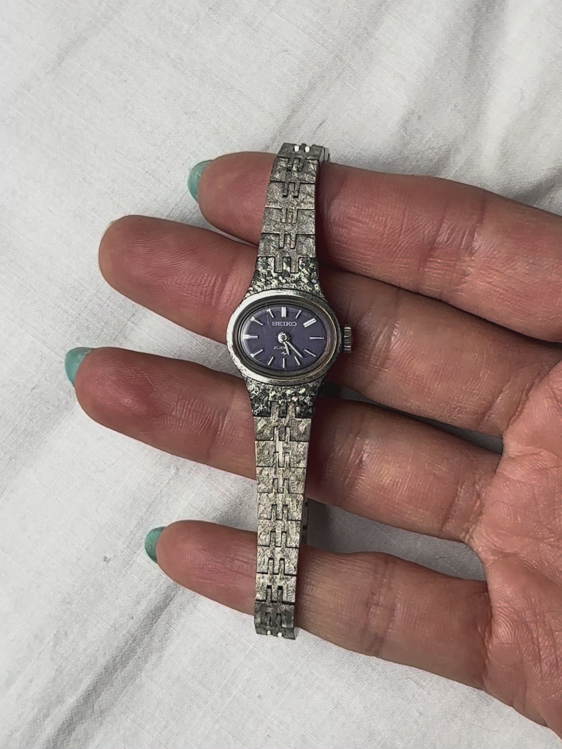 1970s Seiko navy oval silver tone mechanical watch