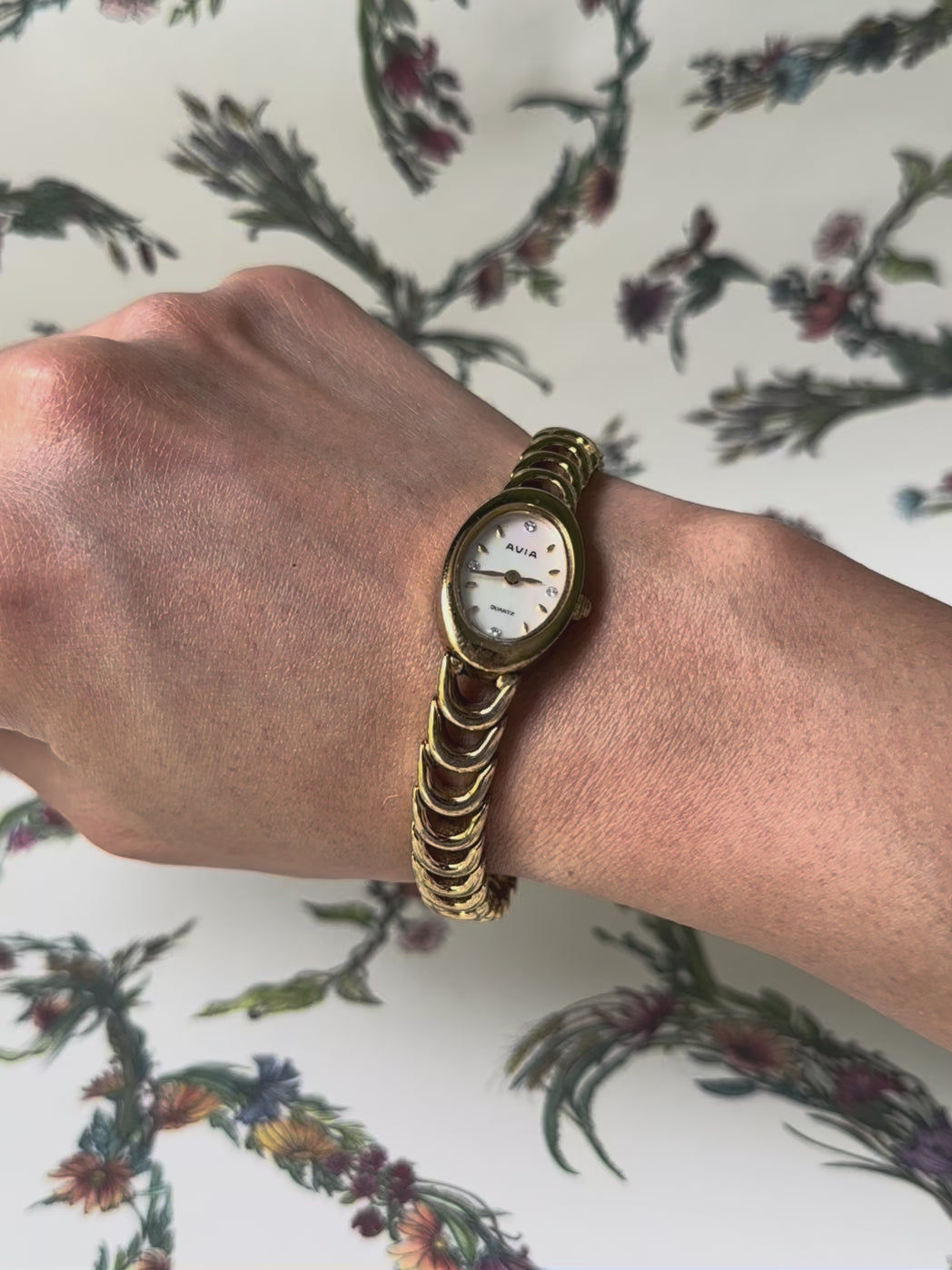1980s Avia mother of pearl gold-plated watch