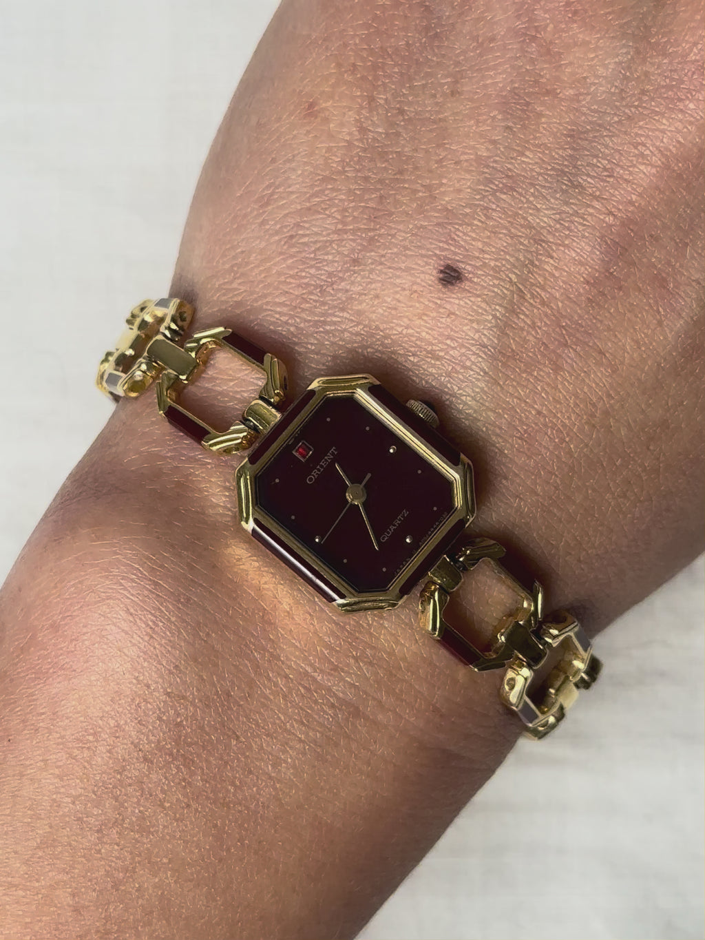 1980s Orient burgundy octagon quartz watch