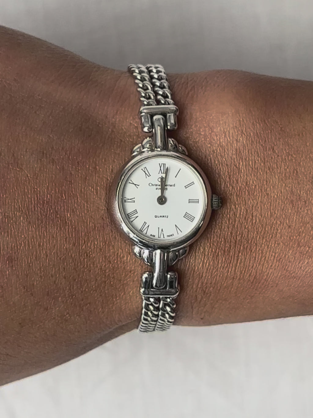 1980s Christian Bernard silver tone chain bracelet quartz watch