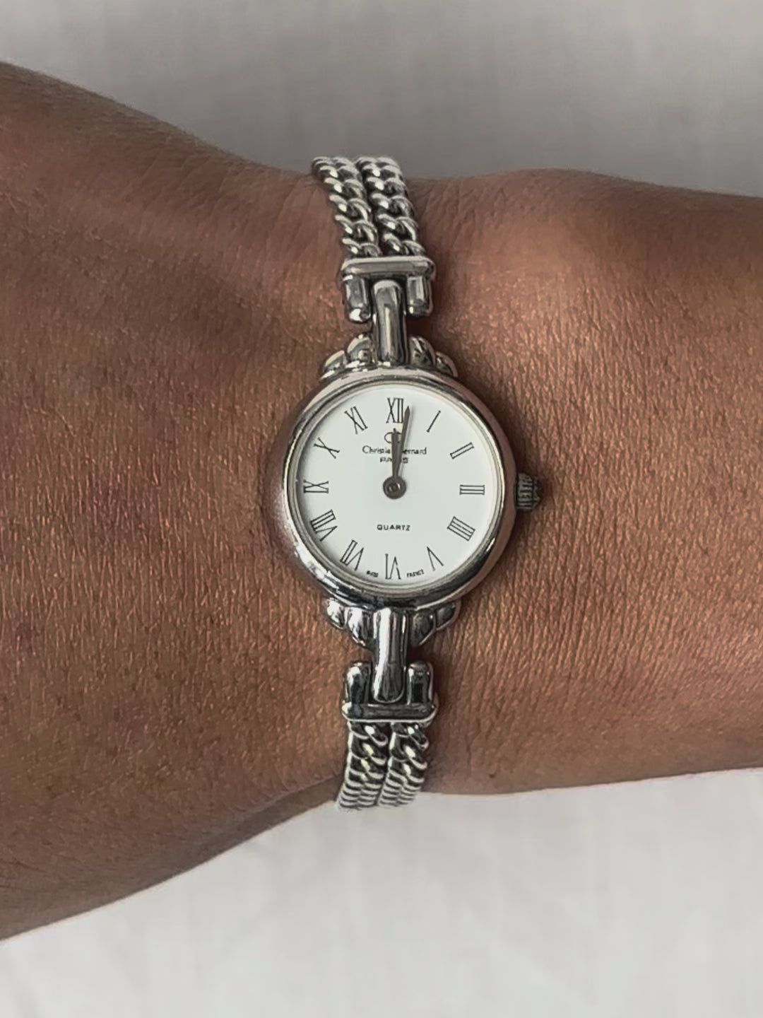 1980s Christian Bernard silver tone chain bracelet quartz watch