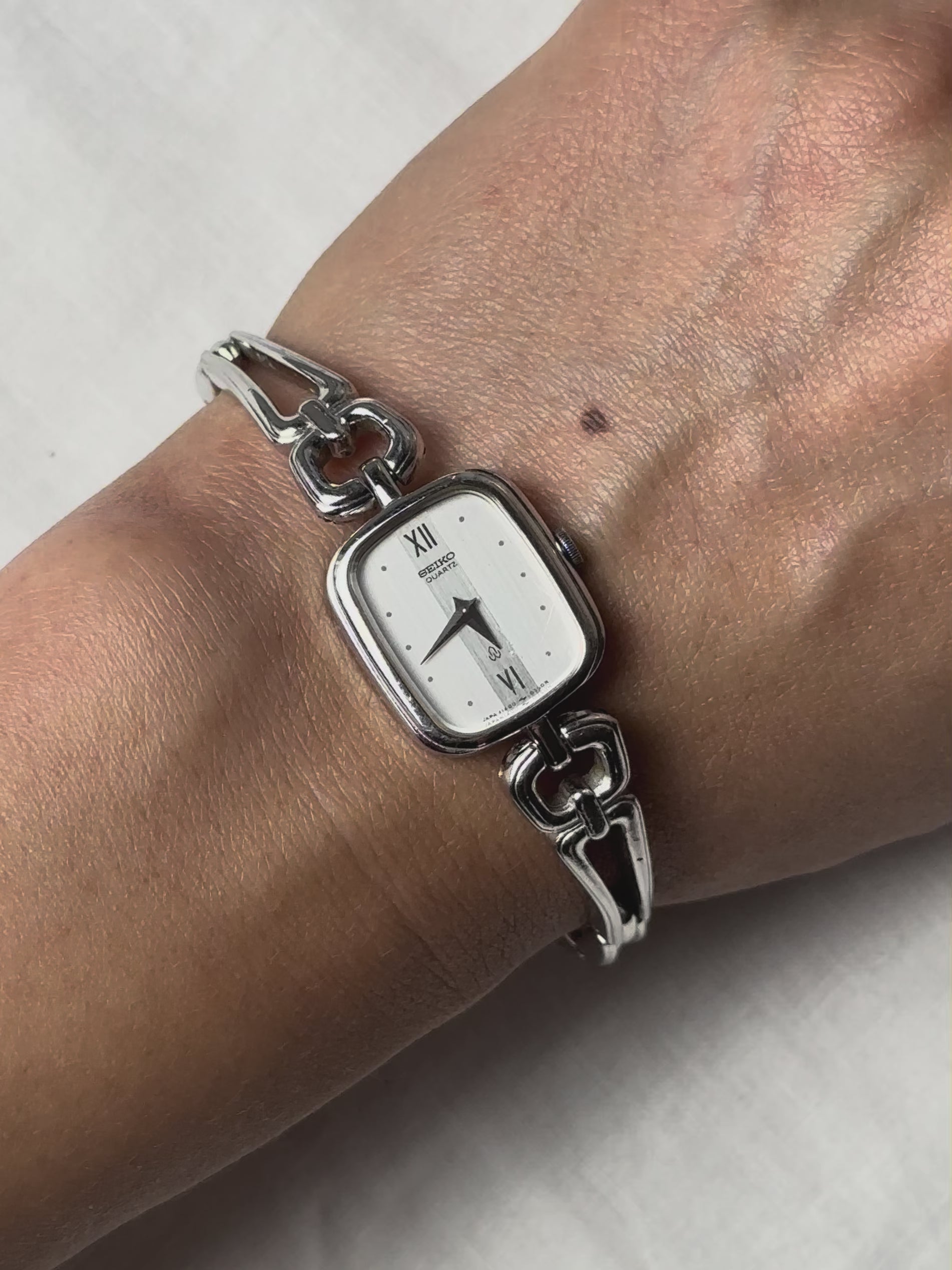 1980s Seiko hollow link silver tone quartz watch